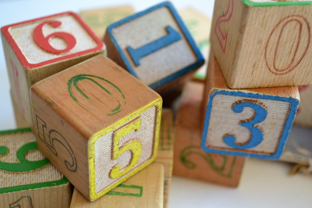 Vintage wooden toy blocks with painted numbers